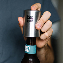 No wrist-twist push down bottle opener