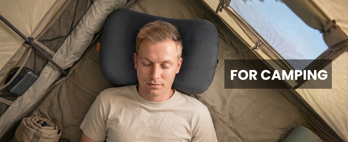 Camping pillow used inside a tent for outdoor sleeping comfort