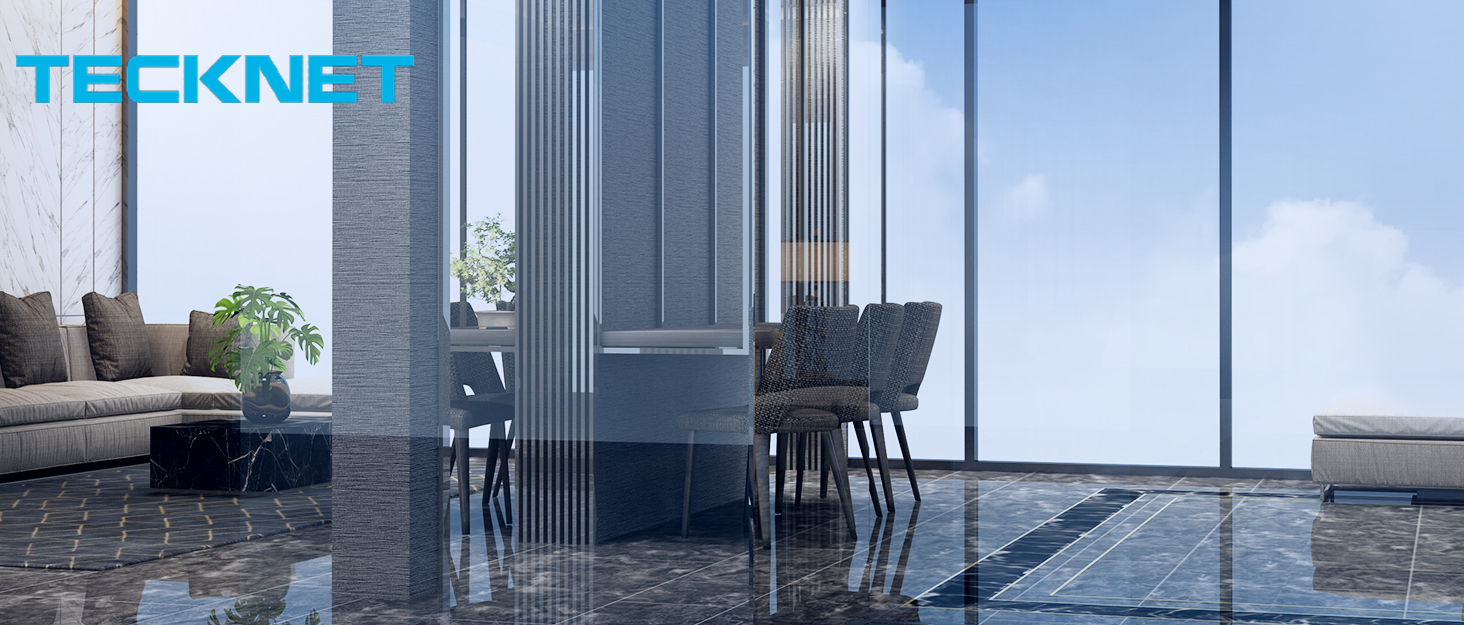 Modern interior with floor-to-ceiling windows, offering a panoramic city view. Features sleek furniture including a sofa and dining set on a glossy blue floor.