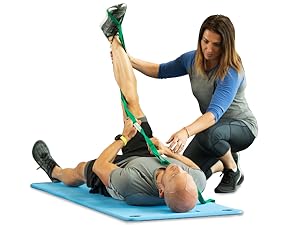 man using stretch out strap while woman helps him