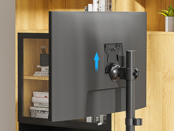 Height-adjustable monitor mount with vertical movement capability, shown mounted to desk. Black metal construction with cable management features visible from rear view.