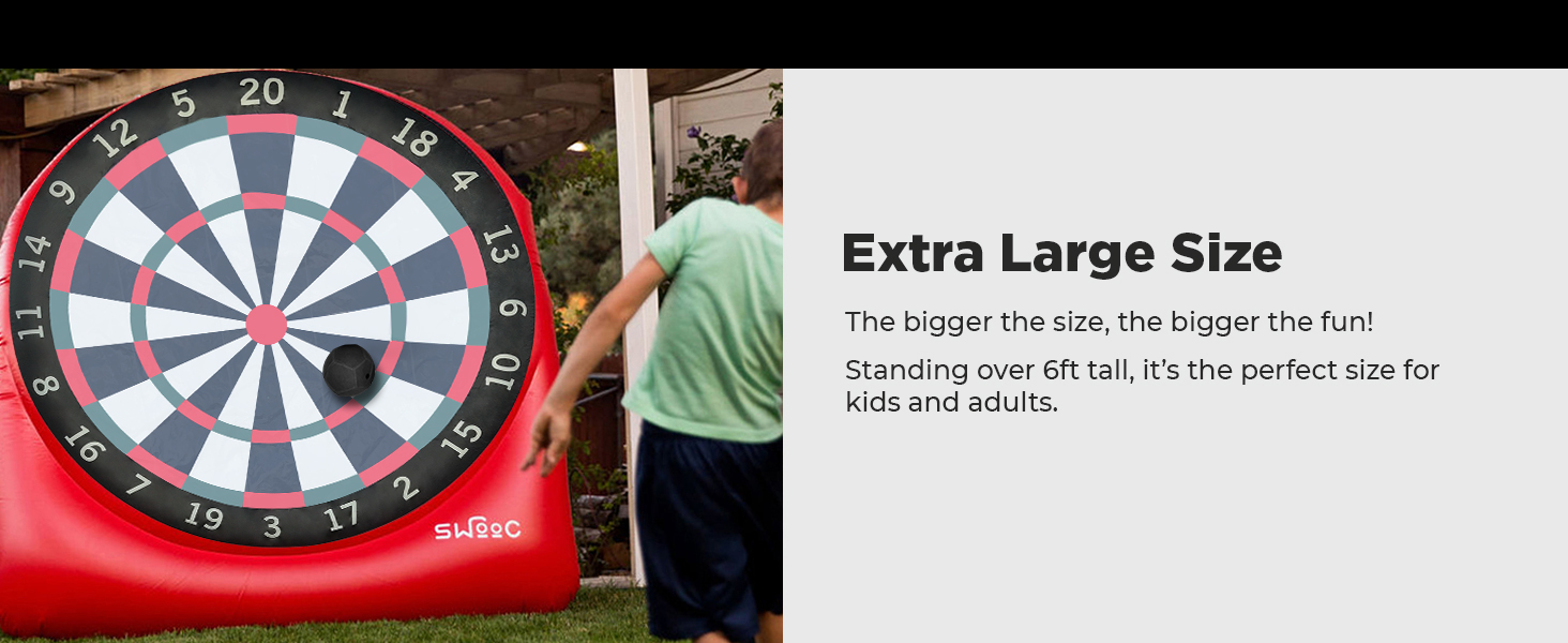 Swooc games for people that do it big. Boy about to kick kickballs at giant dartboard.
