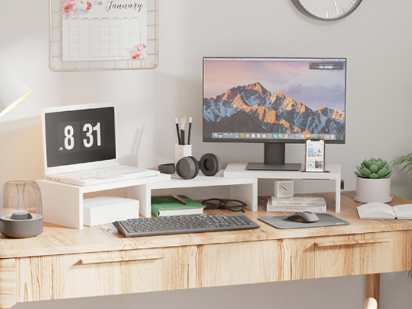 a desk with a computer, keyboard, mouse, and mouse.