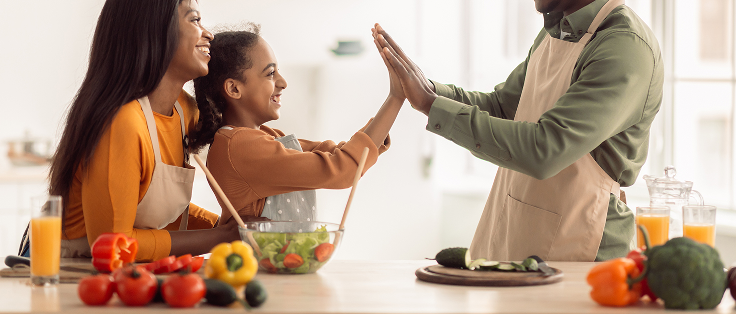 The family is very happy in the kitchen