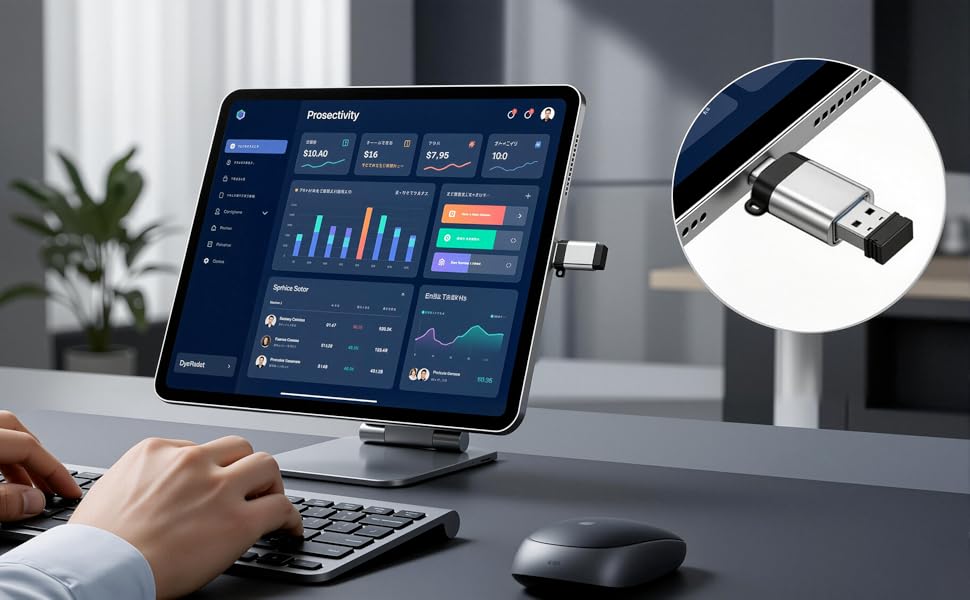 Tablet mounted on adjustable stand displaying business analytics dashboard with graphs and charts. Connected wireless keyboard shown on dark desk surface.