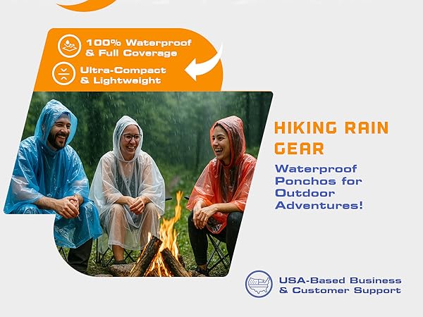 Friends in ponchos by a campfire in the rain