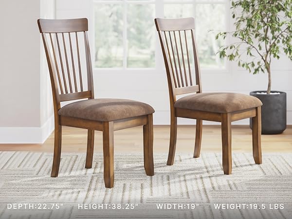Lifestyle scene upholstered dining chairs arranged around a kitchen table