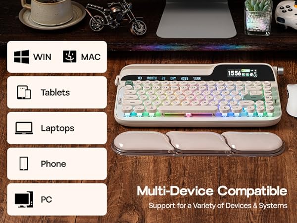 Text reads: 'Multi-Device Compatible'. Shows keyboard with device icons for WIN, MAC, Tablets, Laptops, Phone, PC against wooden desktop background.