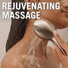 image of a woman using a hand shower with water on