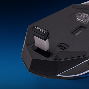 USB dongle is stocked at the buttom of the mouse