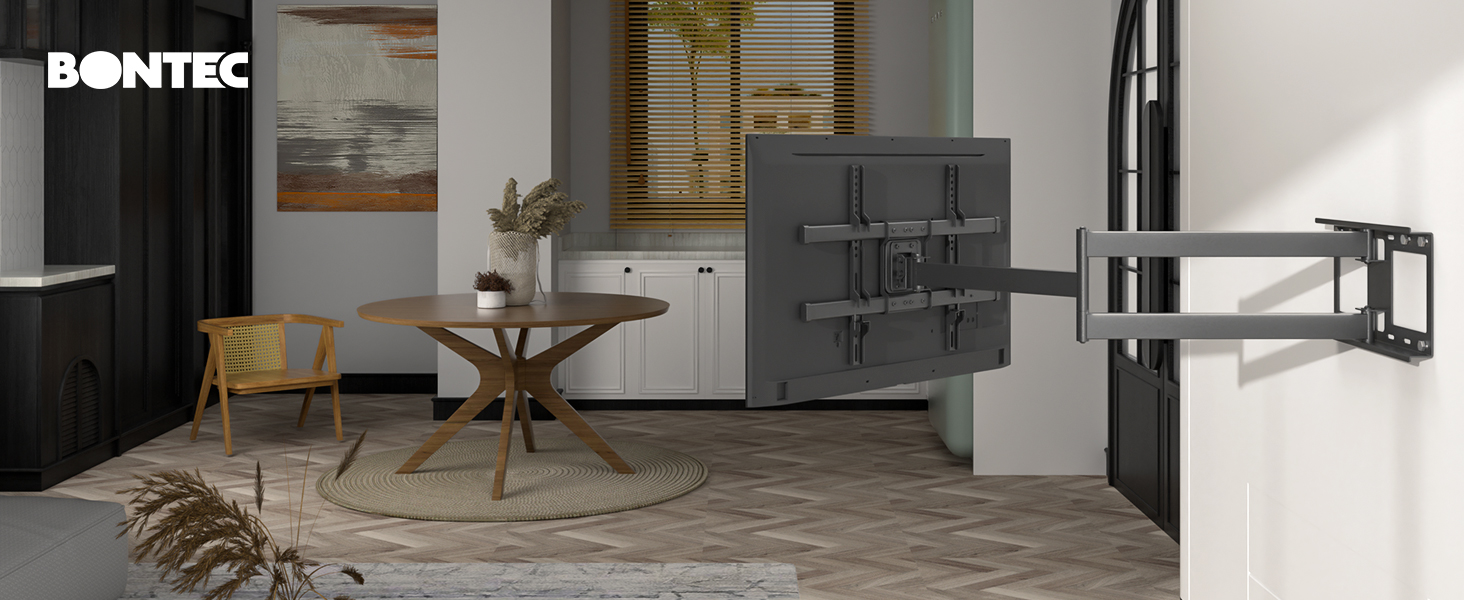 a living room with a tv mounted to the wall.