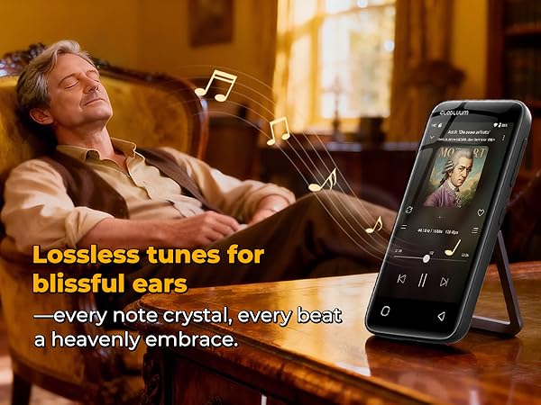 Man relaxing in a chair while an MP3 player plays high-quality classical music nearby.