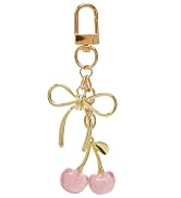 Pink keychain with cherry charm and gold bow, ideal purse accessory or bag charm for women