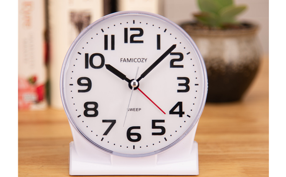 922 white clock on desk