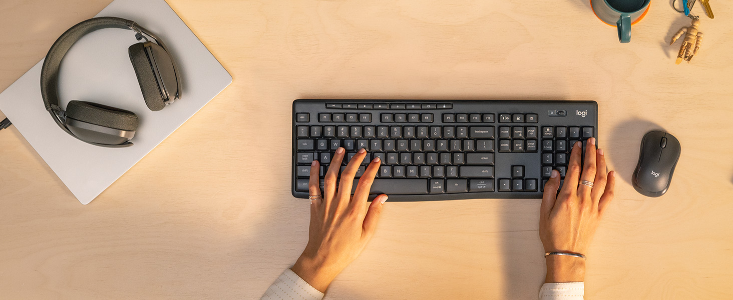 zoom of a woman using mk370 combo for business wireless keyboard and mouse