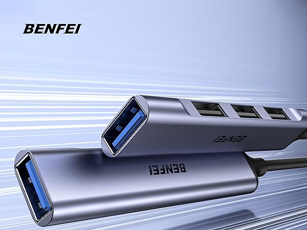 Product showcase of metallic gray USB hub or adapter with multiple ports, shown from various angles in professional lighting against light background.