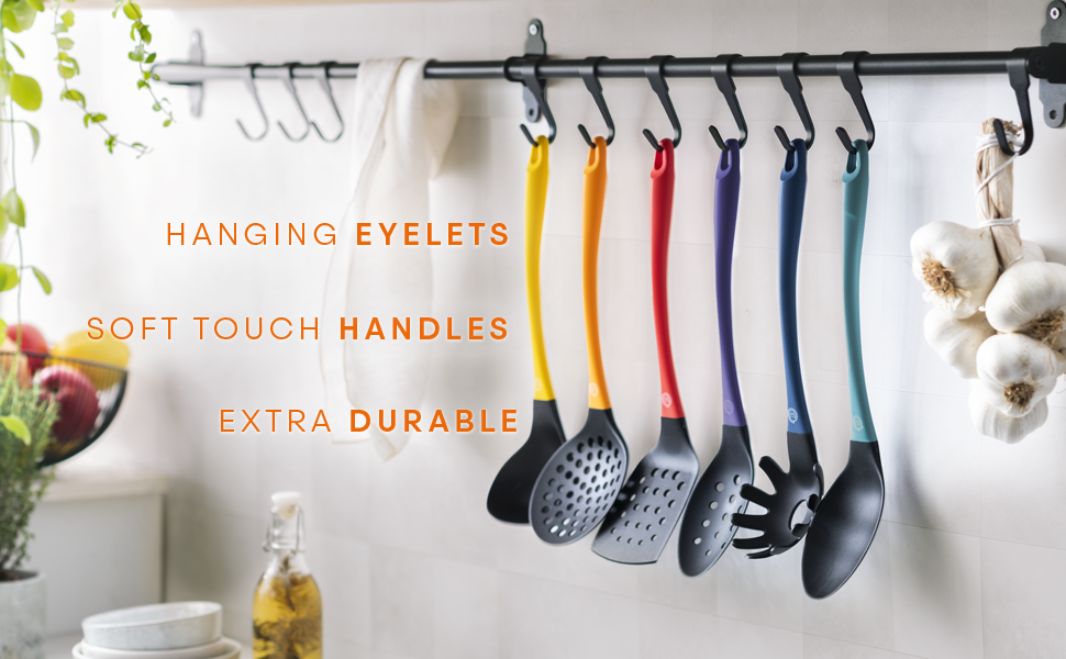 Hanging Colored Utensils on hanging rack with garlic bulbs