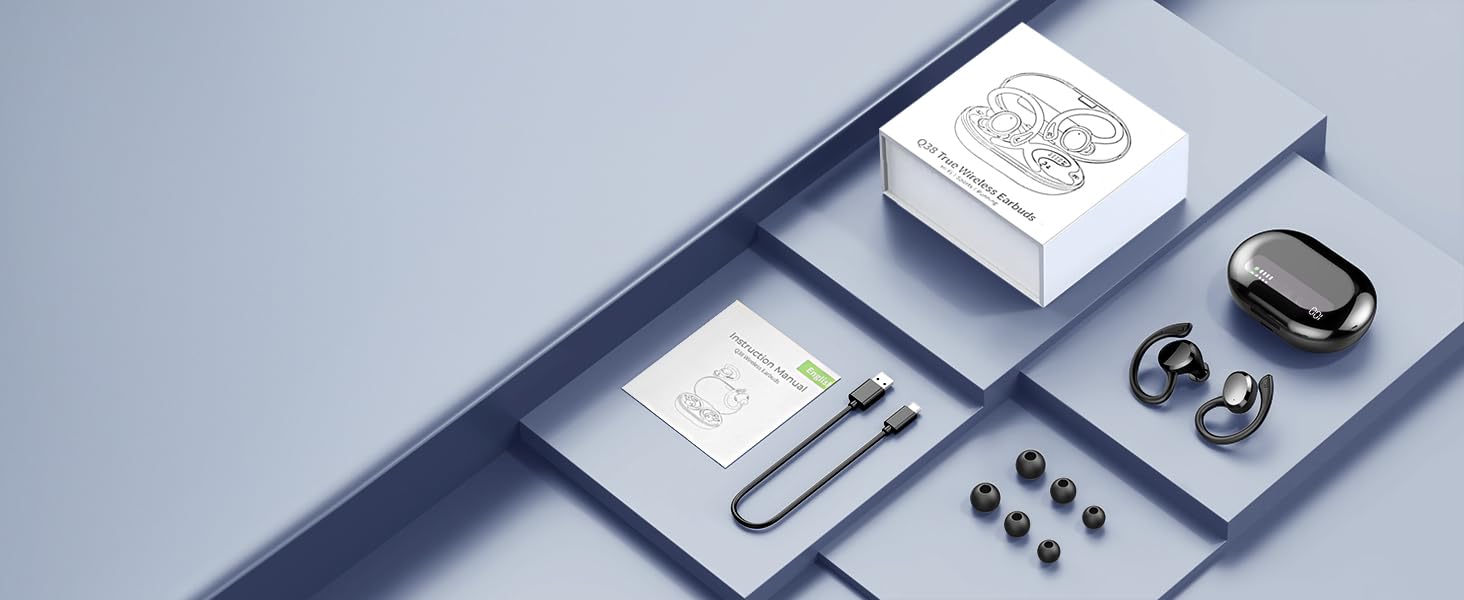 Flat lay of wireless earbuds with charging case, product box, and various ear tips on a gray background. Showcases complete product package contents.