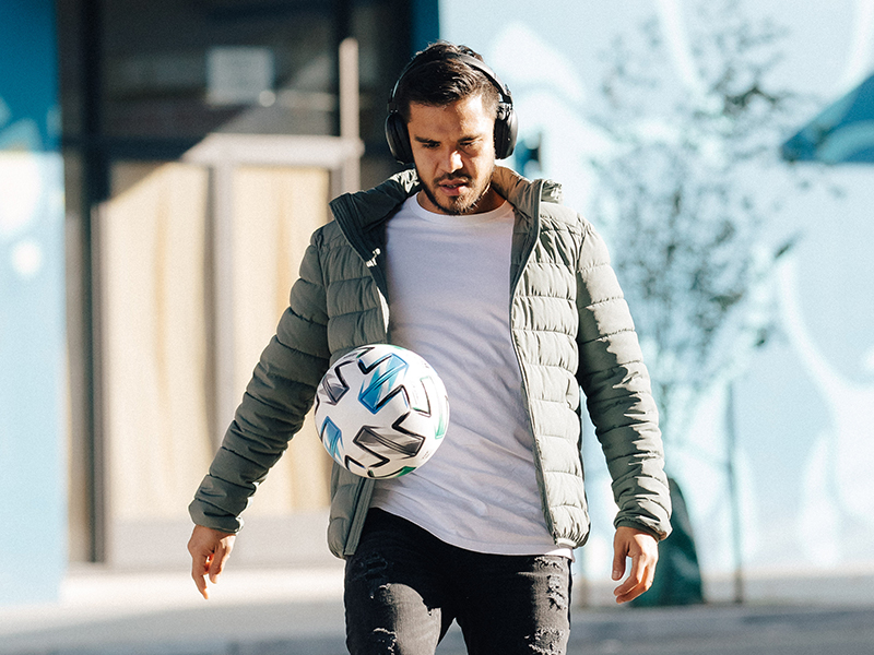 Soccer player with Jlab Headphones