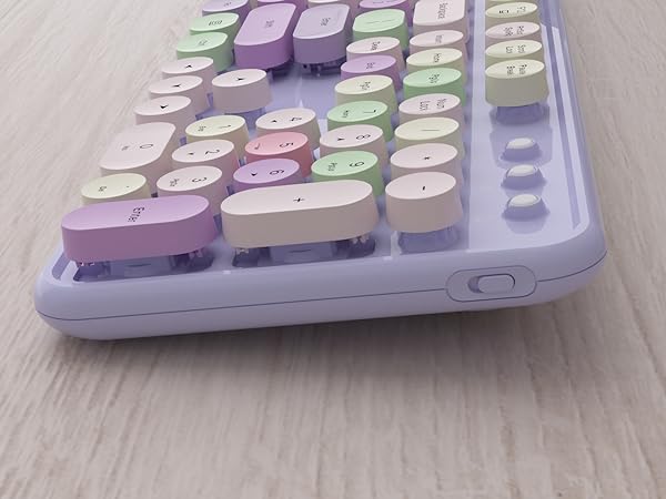 purple colorful wireless keyboard and mouse