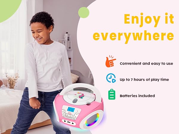 Text reads 'Enjoy it everywhere', 'Up to 2 hours of play time', 'Batteries included'. Marketing display of CD player with product features and usage scenarios.