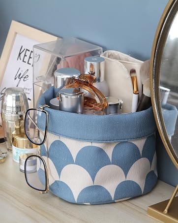 A blue cosmetic organizer on the desk
