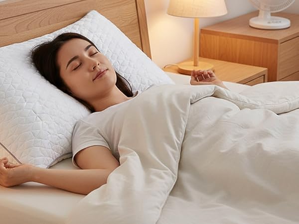 Supportive bed pillow for back sleepers: ergonomic design provides targeted neck and spine support