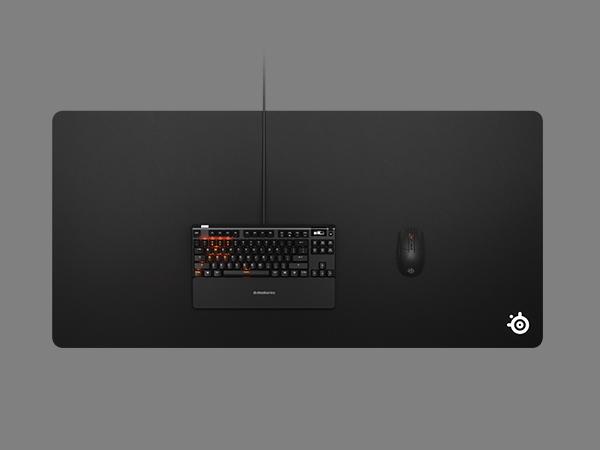 -SteelSeries QcK 3XL mousepad with an Apex keyboard and Rival mouse