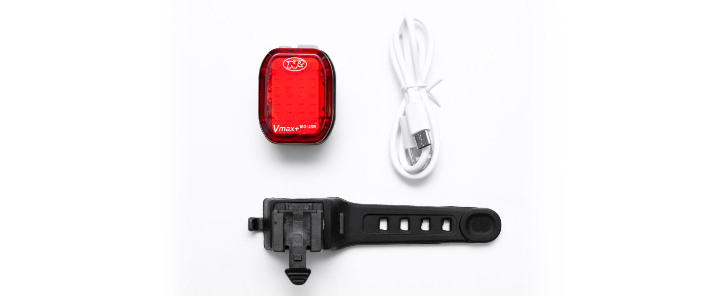 Box Contents showing light, rubber strap seat post mount, and white USB-C charging cable