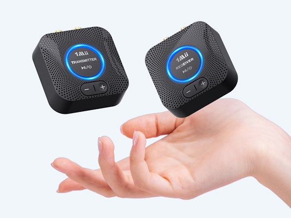 Sequence showing hands holding small black electronic devices with blue circular accents, demonstrating different viewing angles of the product.