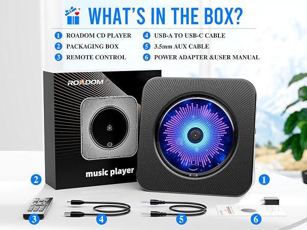 ROADOM portable CD player package with remote, AUX cable, USB cable, power adapter and manual
