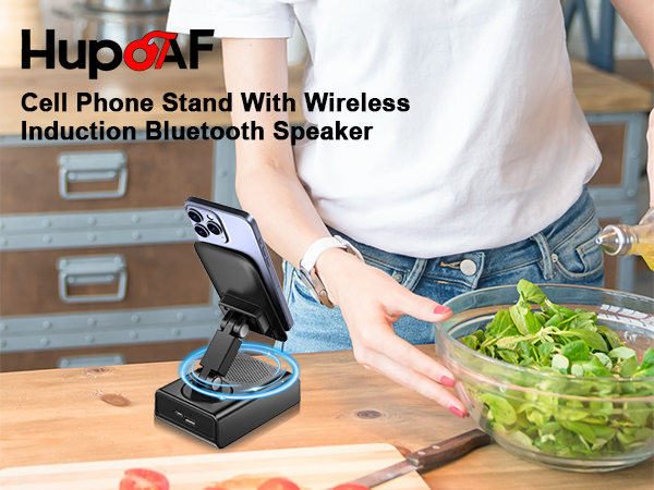 Text reads 'Cell Phone Stand with Wireless Induction Bluetooth Speaker'. Kitchen scene showing hands preparing food with device visible on counter.