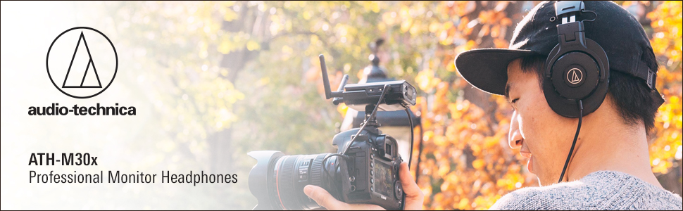 Videographer wearing M30x Headphones in the field