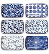 Set of six rectangular ceramic plates with blue and white patterns. Each plate features a unique design including floral, geometric, and abstract motifs.