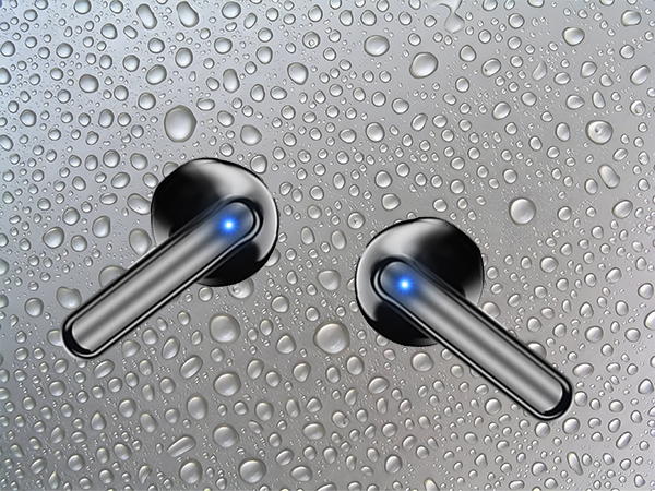 Two black wireless earbuds with elongated stems and blue LED indicators, displayed against a water droplet-covered gray surface, suggesting water resistance.