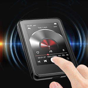 Portable digital music player with touchscreen interface showing circular volume control and playback buttons against black background with light effects.