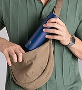 Blue Ever Vessel Mini Water Bottle placed into satchel by a male