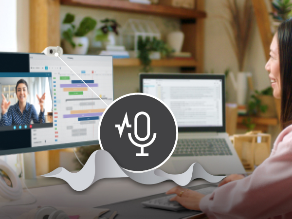 a woman having a video call using brio 100 full hd webcam for meetings and streaming