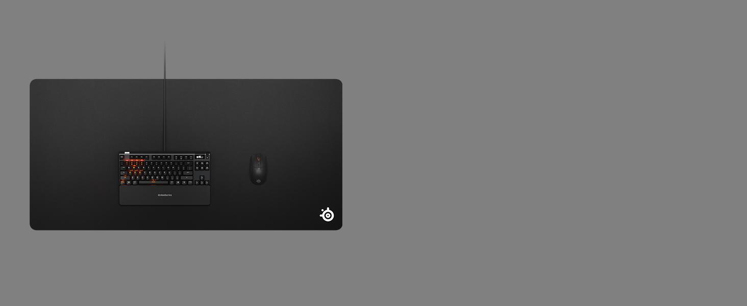 -SteelSeries QcK 3XL mousepad with an Apex keyboard and Rival mouse