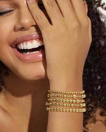 Adoyi gold hoop earrings