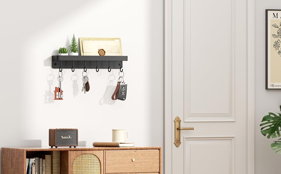 Interior design sequence showing white-walled room with wooden furniture, hanging wall organizers, and decorative plants. Modern minimalist home organization setup.