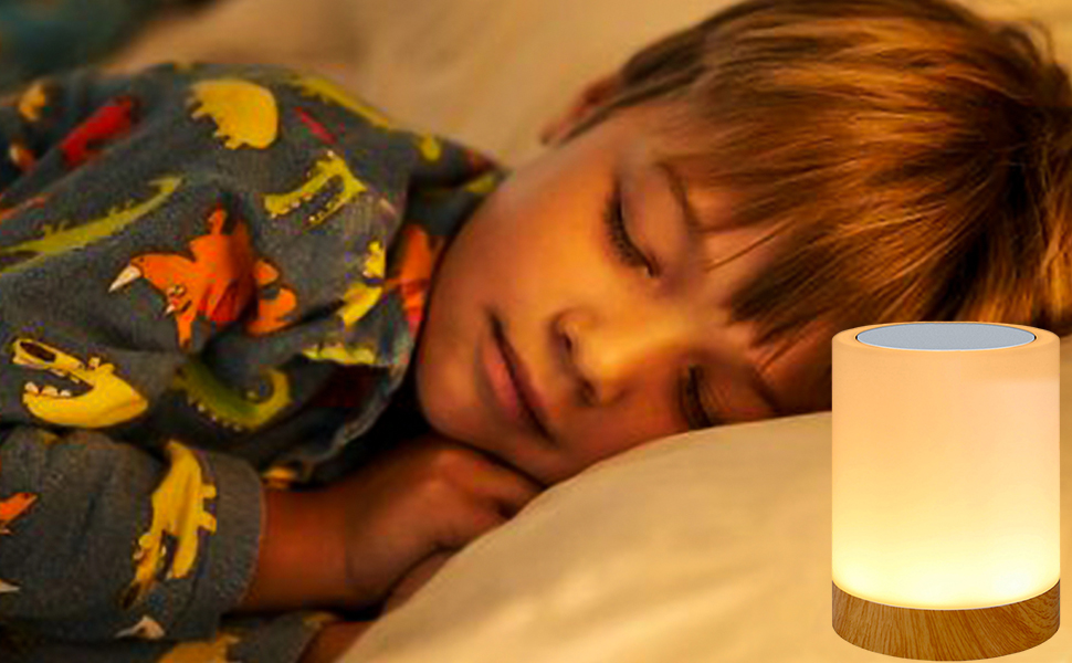Boy sleeping peacefully with a night light