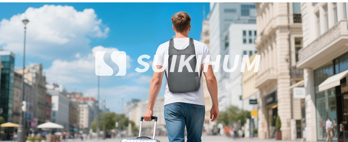 Man with SUIKIHUM backpack traveling in city.