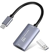 USB-C to HDMI adapter with USB-A port. Gray metal housing, black cable. Includes separate USB-A flash drive. Adapter enables video output and data transfer simultaneously.