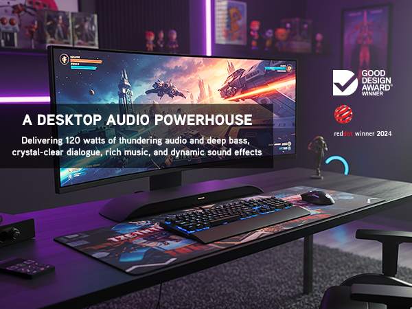 Desktop gaming setup with widescreen monitor and slim soundbar delivering powerful audio underscreen