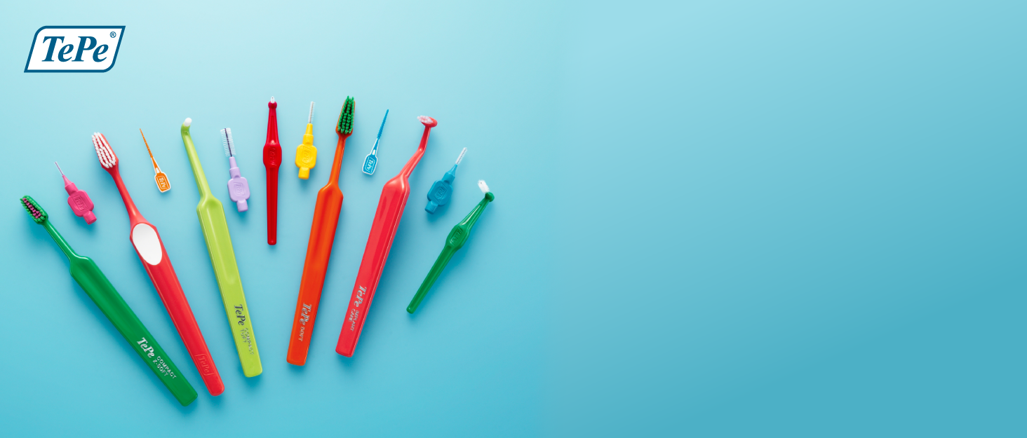 Colorful toothbrushes, dental floss picks, and interdental brushes by TePe against a blue backdrop.