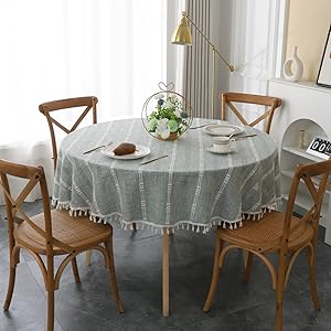 Round tablecloth, grey linen, tassel trim, classic dining, chic textile