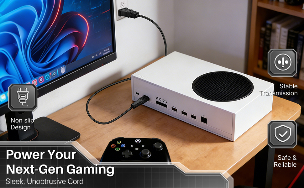 Gaming console on a desk powered by a two prong power cord for a clean setup.