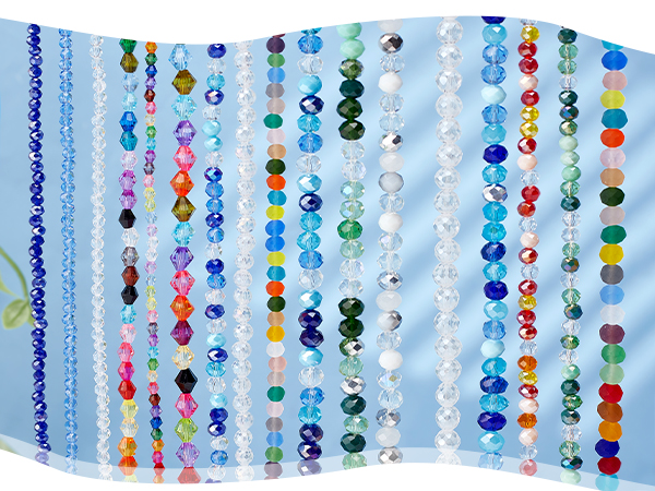 Multiple strands of colorful crystal beads hanging vertically. Various sizes and shapes of beads in blue, pink, green, white, and other colors.