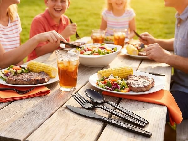 Users happily using disposable plastic cutlery at a family gathering